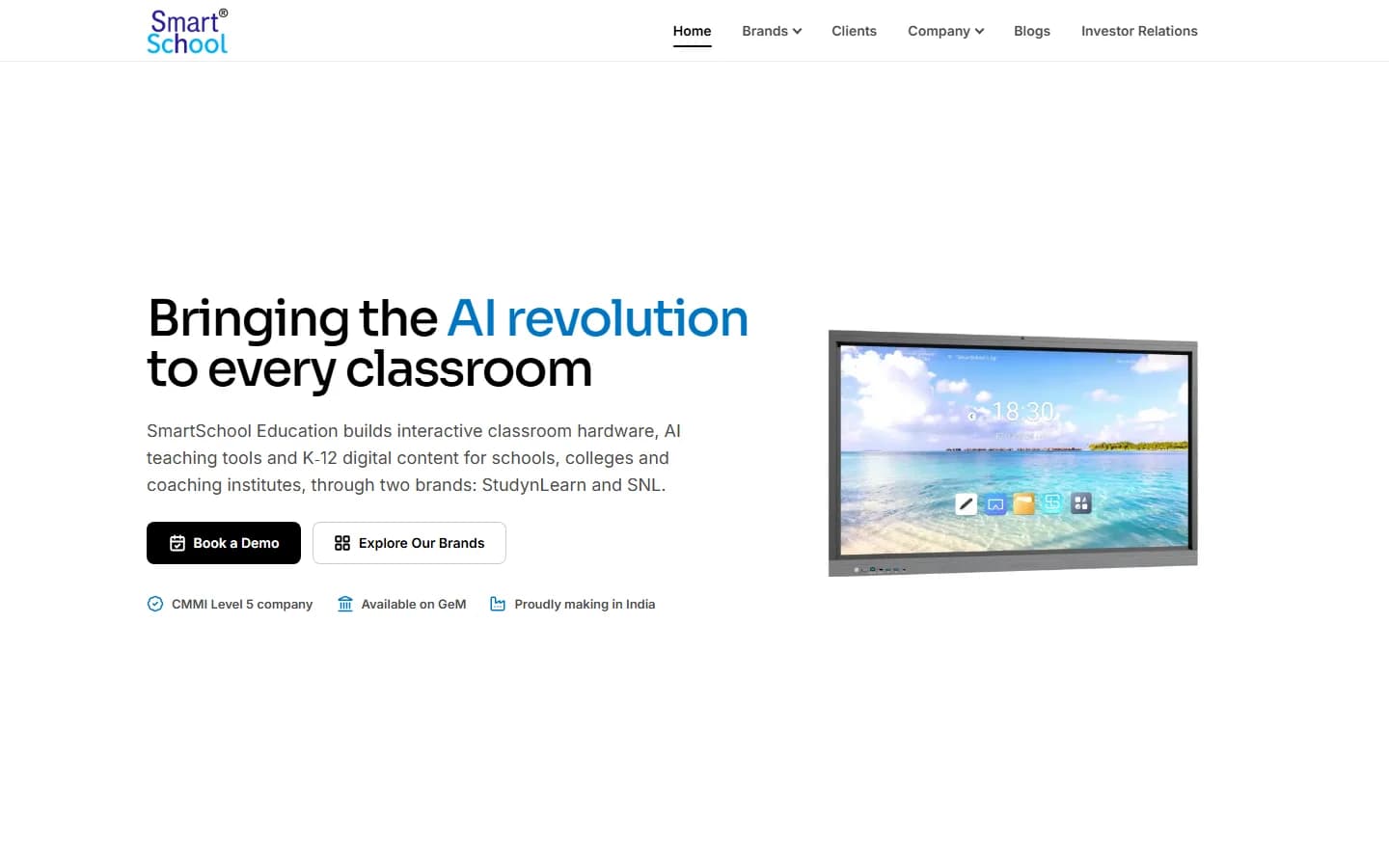 V2 homepage on desktop: the headline 'Bringing the AI revolution to every classroom', Book a Demo button and an interactive panel.